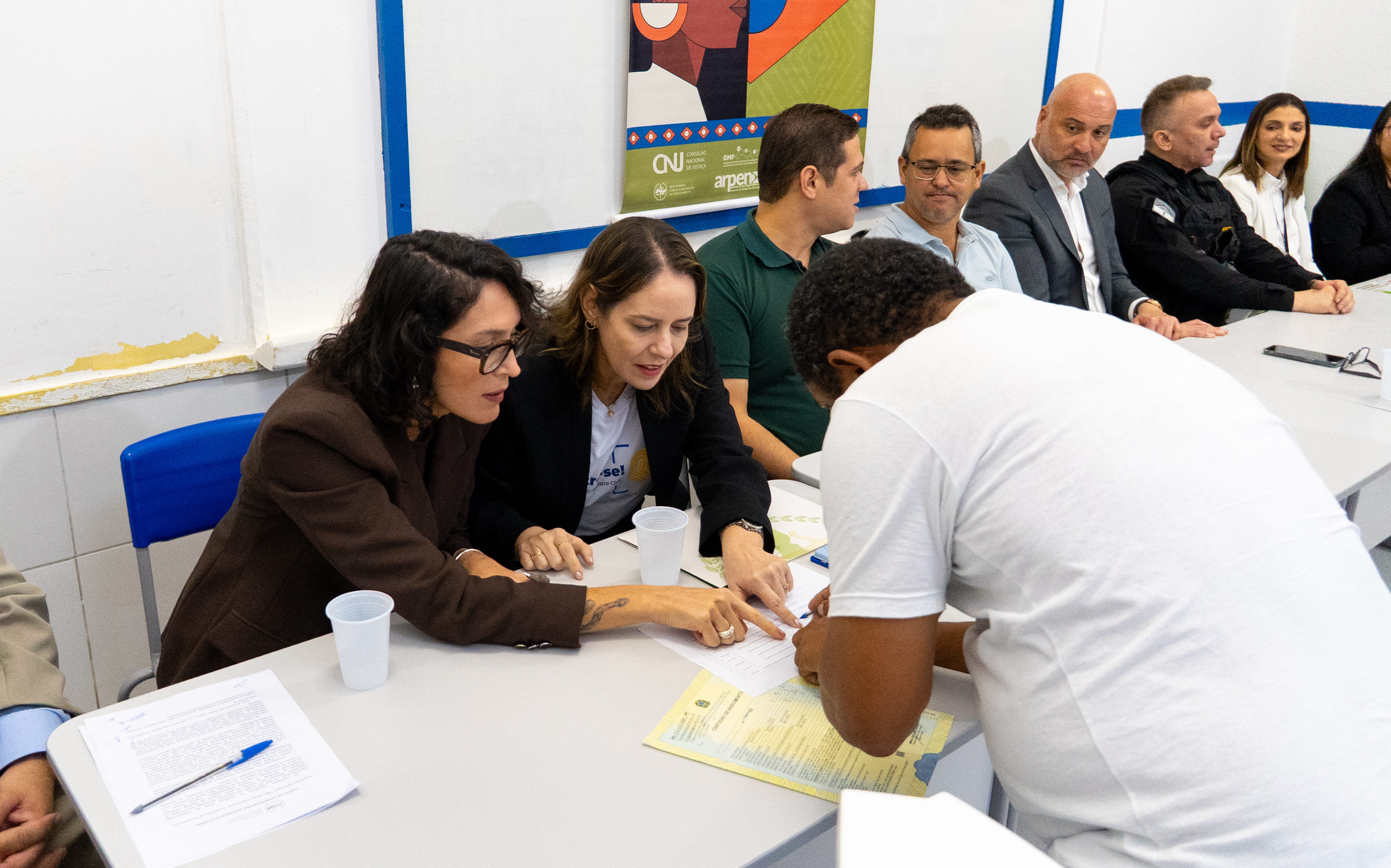 Mesa de honra do evento de entrega das certidões retificadas